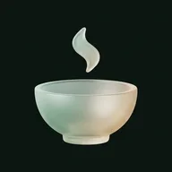 A frosted glass rice bowl with a curl of steam
